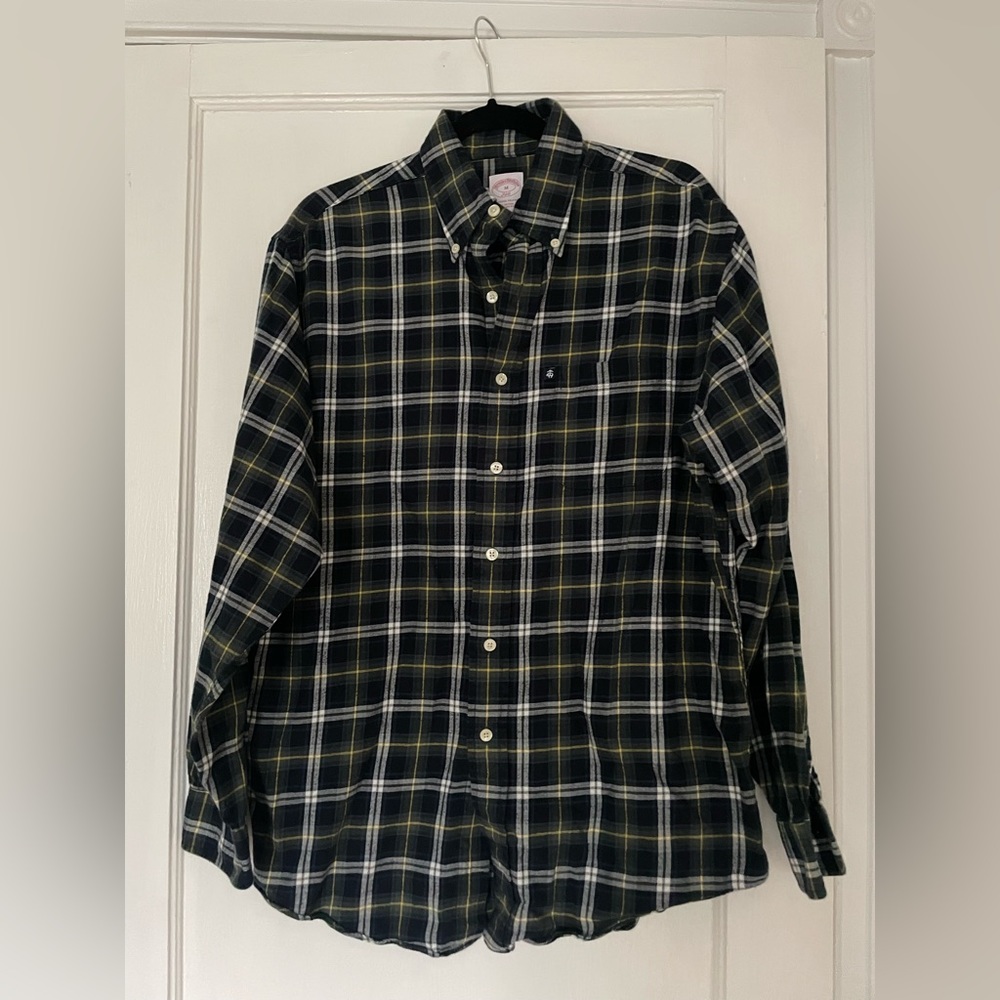 Brooks Brothers the original polo shirt. Button down flannel. Plaid.